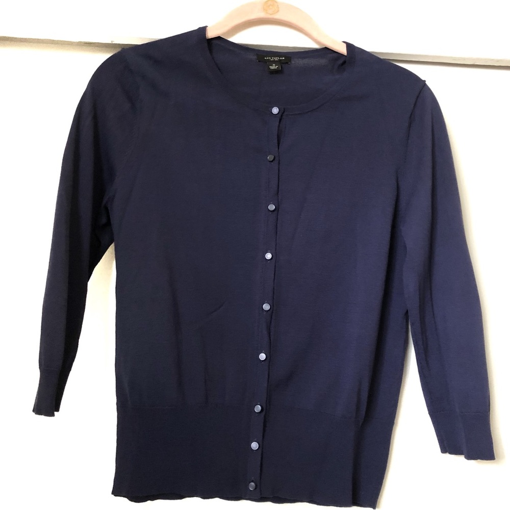Ann Taylor: navy blue woman’s sweater. Long sleeve with buttons in the front.